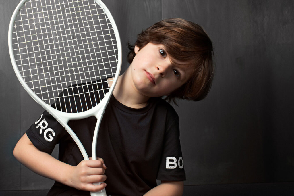 pojke med tennisracket