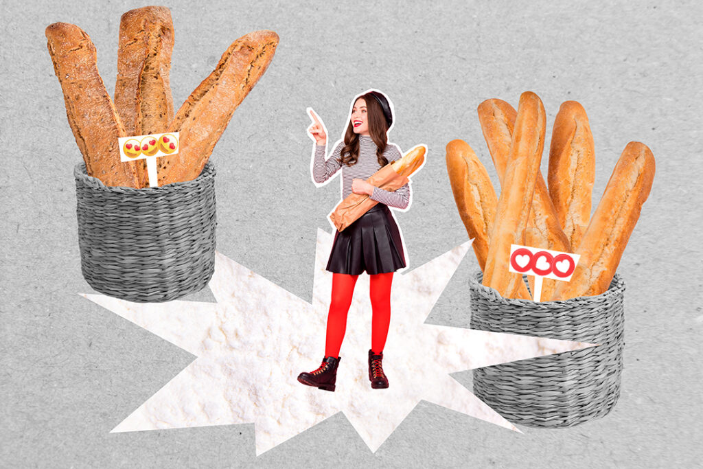 En tjej med baguetter i famnen står mellan två stora baguettkorgar
