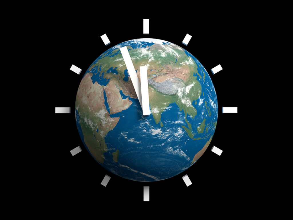 Jorden som en klocka som visar nästan kl 12