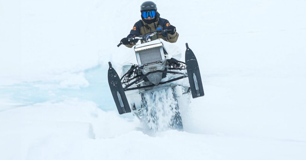 Vidde snöskoter i miljö