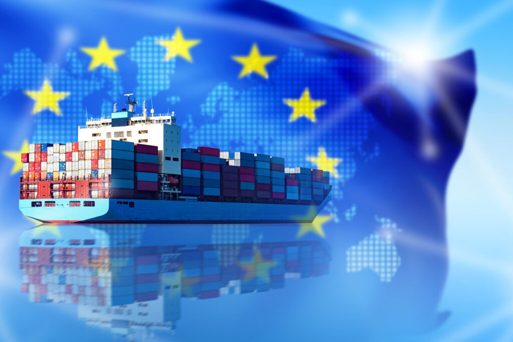 Containerfartyg med EU-flaggan i bakgrund